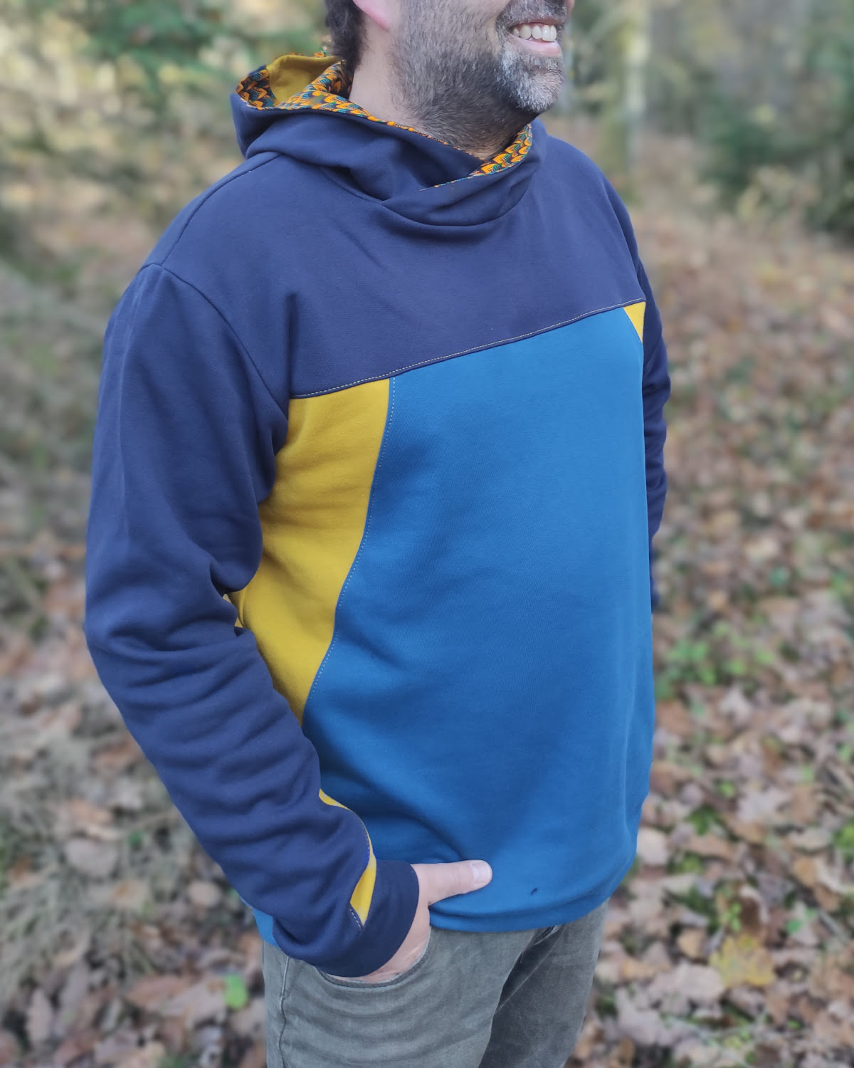Handmade hoodie in organic cotton, blue and yellow and wax fabric